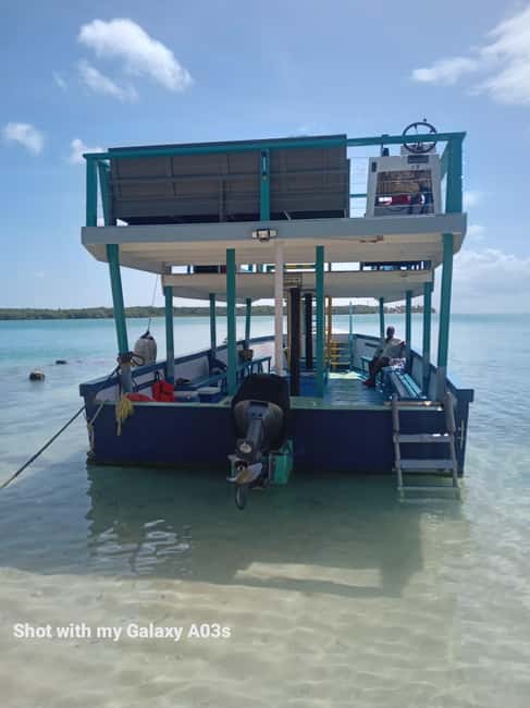 Tobago: Buccoo Reef Marine Park Glass Bottom Boat Tour - Boarding the Prestige International at 11 a.m.