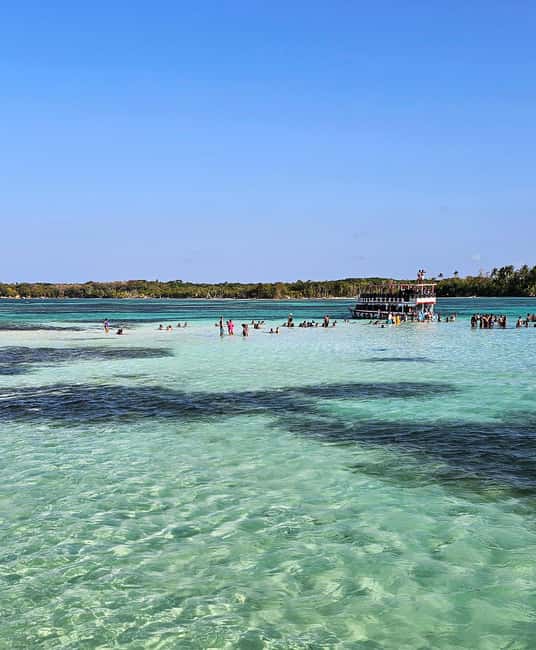 Tobago: Coral Reef Boat Tour with BBQ and Transfer - Nylon Pool for swimming and a floating pause